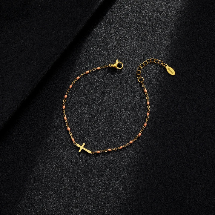 W&W Mode | Goldfarbene Kreuzarmband