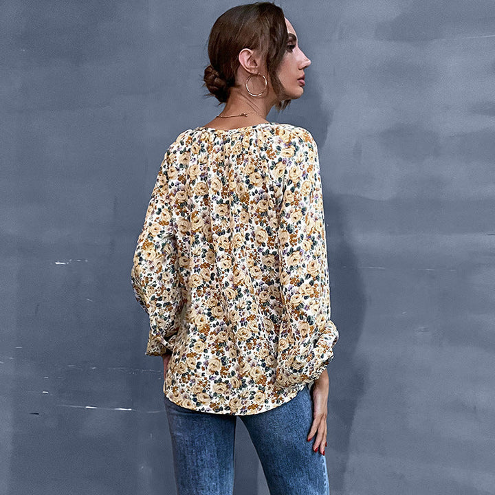 Damen Bluse mit floralem Design und eleganten Puffärmeln W&W Mode