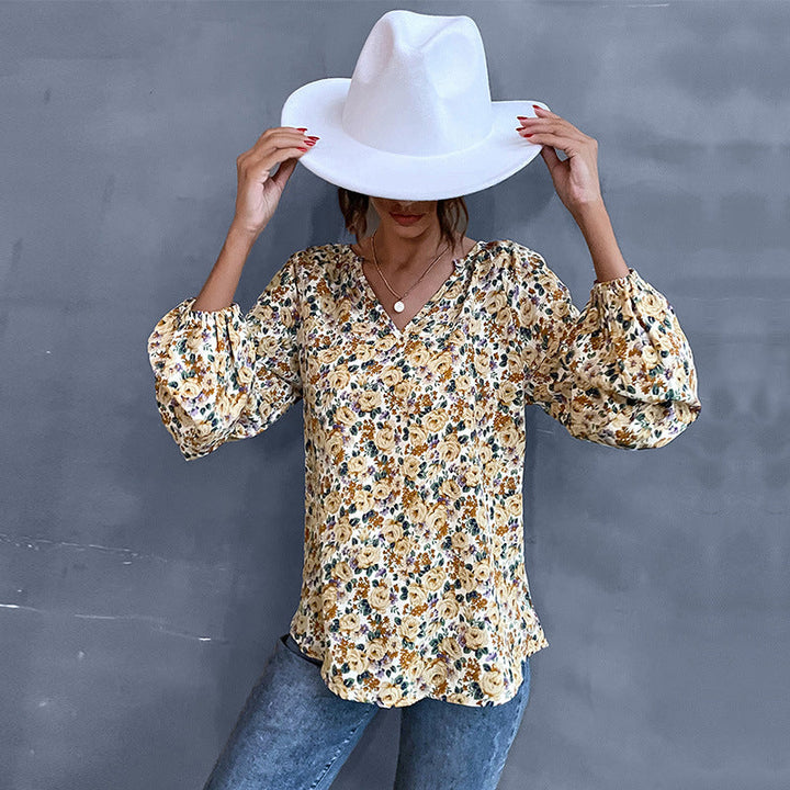 Damen Bluse mit floralem Design und eleganten Puffärmeln W&W Mode